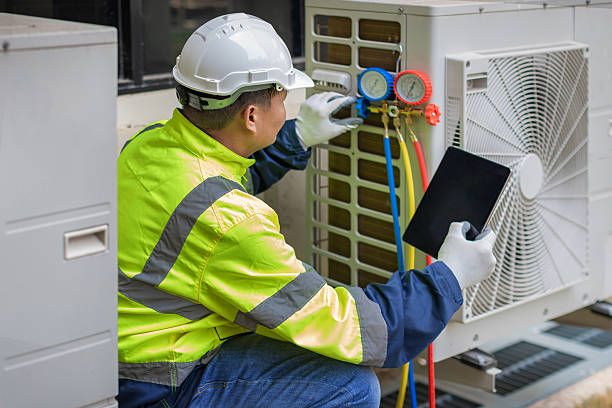 Professional Hvac technician working in Evans, WV
